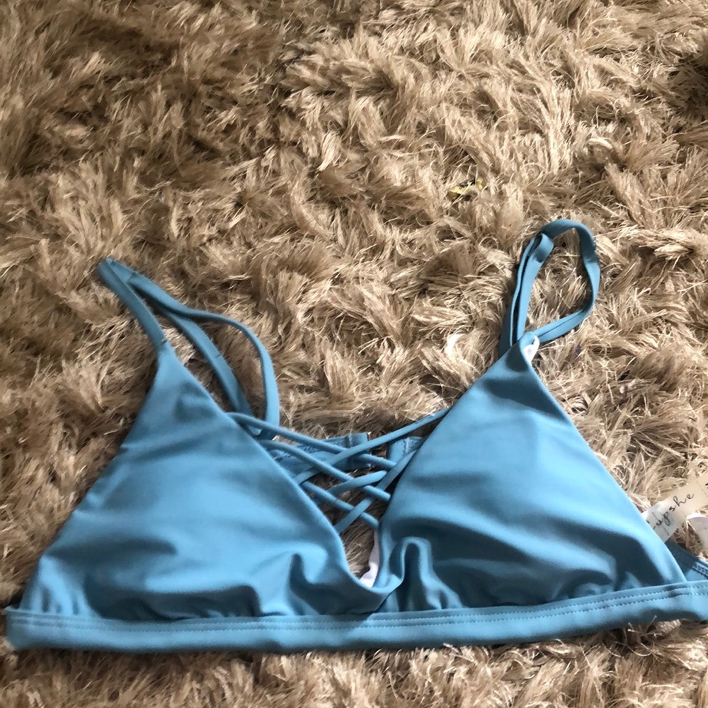 A blue bikini top